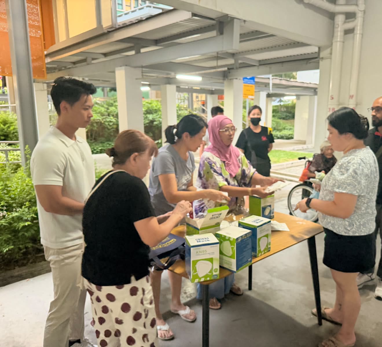 Neighbours gathered at a table of masks in Hougang.